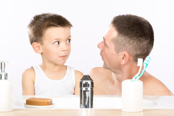 Father and son look on Stock Photo