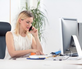 Female secretary contact customer Stock Photo