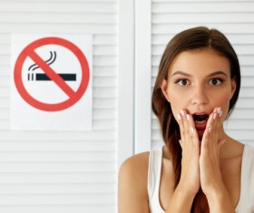 Girl and quit smoking sign Stock Photo 01
