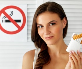 Girl and quit smoking sign Stock Photo 02