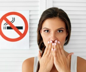 Girl and quit smoking sign Stock Photo 04