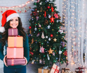 Girl receiving Christmas present Stock Photo 01