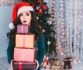 Girl receiving Christmas present Stock Photo 02