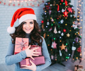 Girl receiving Christmas present Stock Photo 03