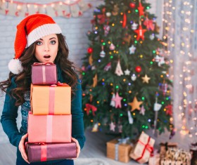 Girl receiving Christmas present Stock Photo 04