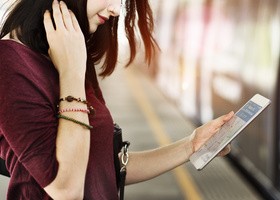 Girl waiting for the subway train Stock Photo