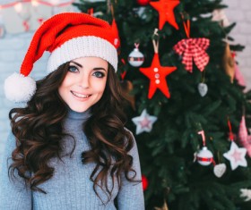 Girl wearing Christmas hats Stock Photo