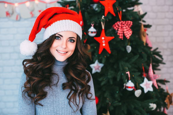 Girl wearing Christmas hats Stock Photo
