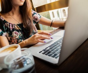 Girl working in front of a computer Stock Photo