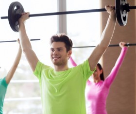 Gym weightlifting coach Stock Photo