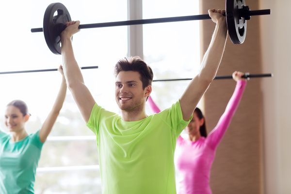 Gym weightlifting coach Stock Photo