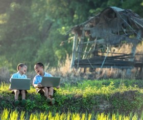 Happy child playing with Tablet PC Stock Photo