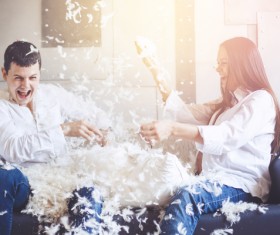Happy couple pillow fight Stock Photo 03