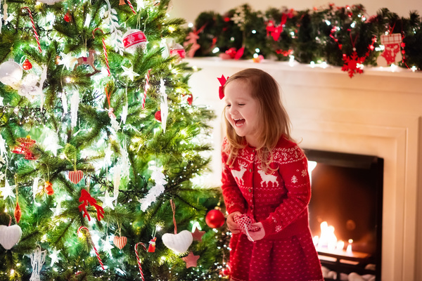 Happy little girl decorated Christmas tree Stock Photo 01