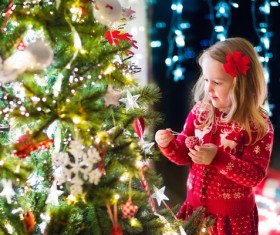 Happy little girl decorated Christmas tree Stock Photo 02