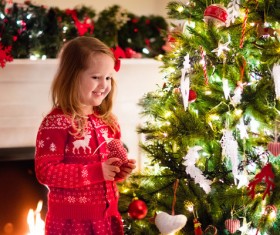 Happy little girl decorated Christmas tree Stock Photo 03