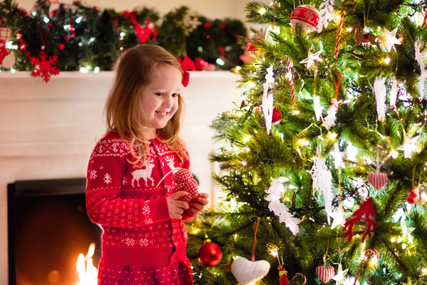 Happy little girl decorated Christmas tree Stock Photo 03