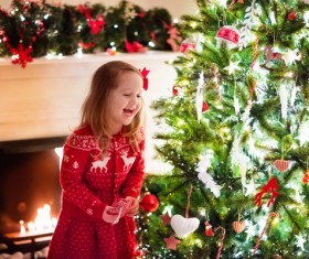 Happy little girl decorated Christmas tree Stock Photo 04