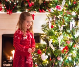 Happy little girl decorated Christmas tree Stock Photo 05