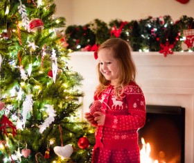 Happy little girl decorated Christmas tree Stock Photo 06