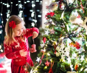 Happy little girl decorated Christmas tree Stock Photo 07