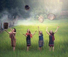 Happy women in the field Stock Photo
