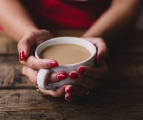 Holding a cup of tea close-up Stock Photo