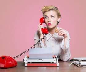 Holding donut girl answered the phone Stock Photo