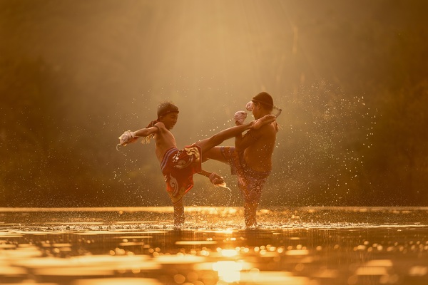 In the small river practicing Muay Thai boy Stock Photo 02