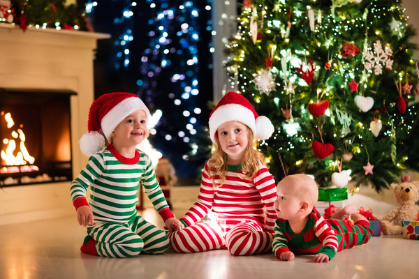 Kids happy before the Christmas tree Stock Photo 04