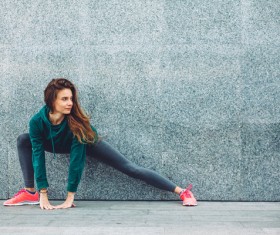 Legs stretching exercise for girl Stock Photo 01