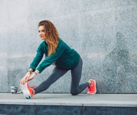 Legs stretching exercise for girl Stock Photo 02