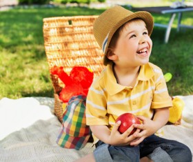 Little boy having picnic happy Stock Photo