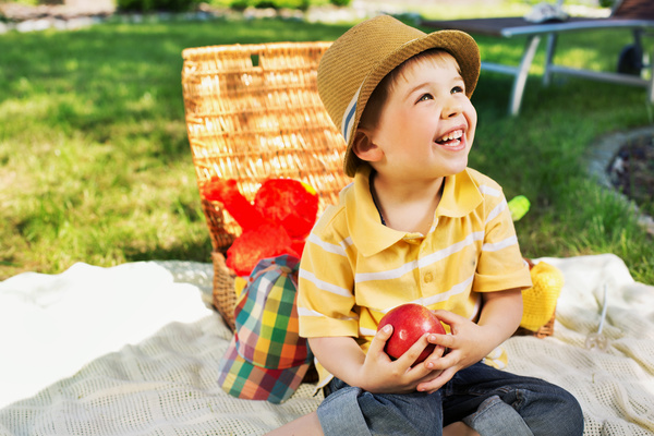 Little boy having picnic happy Stock Photo