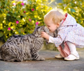 Little girl and pet cat Stock Photo