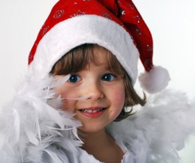 Little girl in Christmas dress Stock Photo