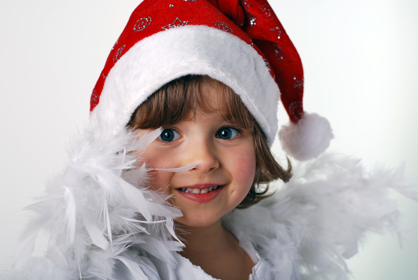 Little girl in Christmas dress Stock Photo