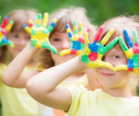 Little hands stained with paint Stock Photo
