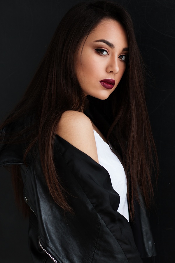 Makeup girl in leather jacket Stock Photo
