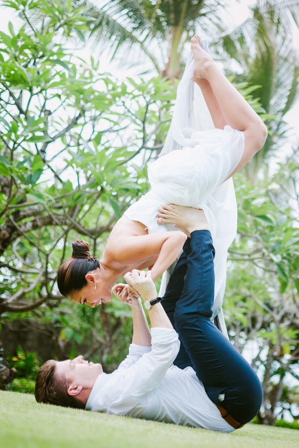 Men and women practicing yoga Stock Photo