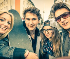 Men and women taking photos with smartphones Stock Photo 02