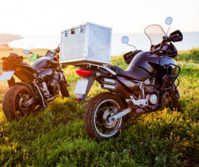 Motorcycles parked on the grass Stock Photo