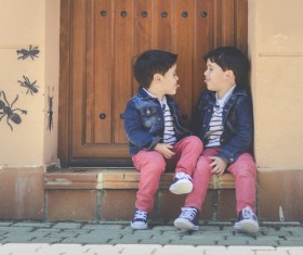 Naughty twin brothers Stock Photo