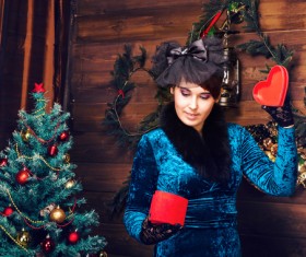 Open Christmas gift woman Stock Photo