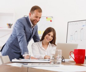 Smiling boss with secretary Stock Photo 02