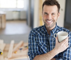 Smiling man drinking coffee Stock Photo 02