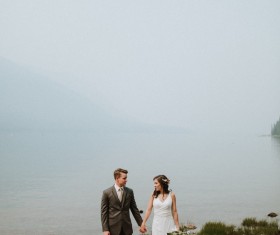Stand by the lake shooting wedding photos Stock Photo
