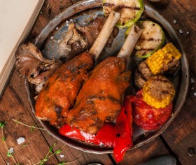 Stewed meat and beans in tomato sauce with greens Stock Photo 05