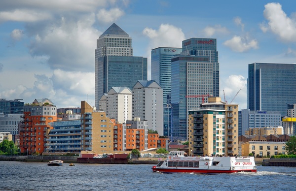 Tall buildings by the river Thames Stock Photo