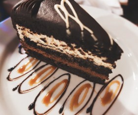 Tiramisu cake with cut pieces Stock Photo